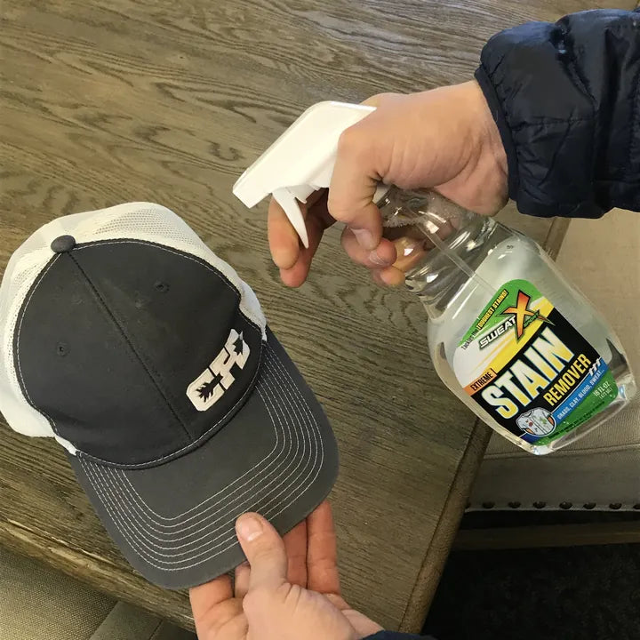 Spraying the front crown of a baseball cap